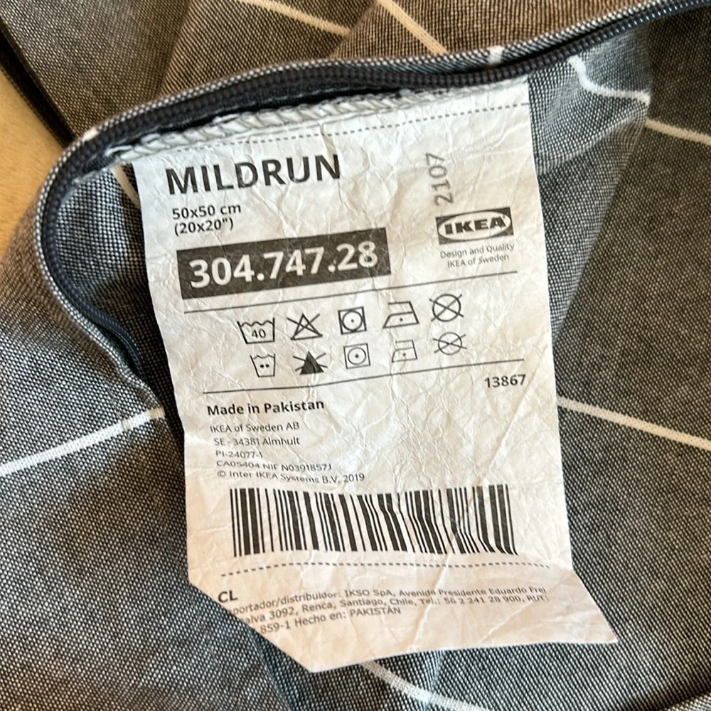 Two IKEA Mildrun pillow covers